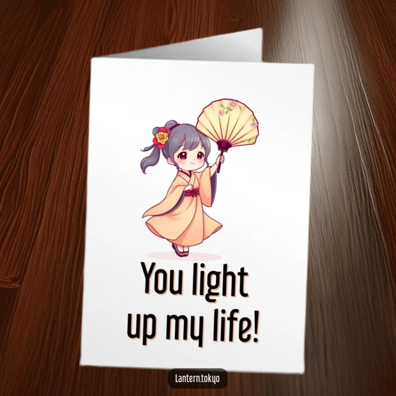 Free Printable Birthday Card: A lantern character in a flowing kimono elegantly twirls a floral fan, conveying birthday wishes with grace.